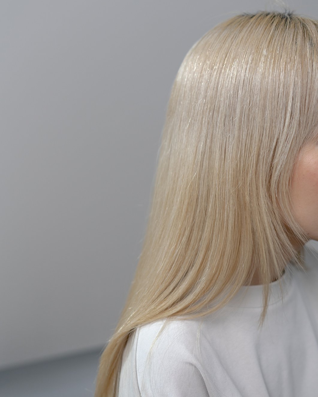 Woman's Blonde Hair on White Background